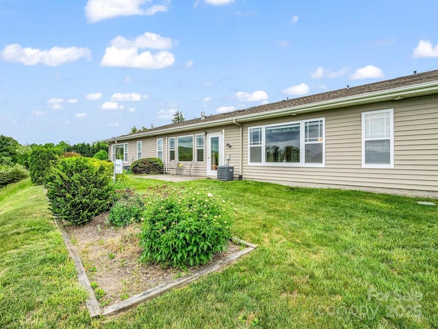 5802 Wood Duck Way, Hendersonville, NC 28792 - back of house with a yard, central air condition unit, and a patio area