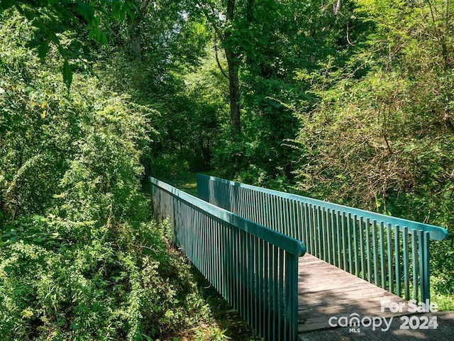 5802 Wood Duck Way, Hendersonville, NC 28792 - deck featuring a forest view