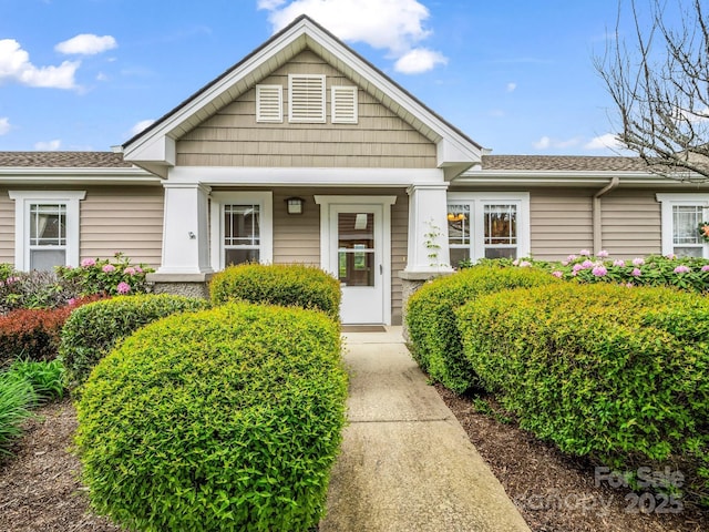 5802 Wood Duck Way, Hendersonville, NC 28792 - view of front of home with a porch and a shingled roof