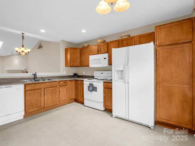 5802 Wood Duck Way, Hendersonville, NC 28792 - kitchen featuring white appliances, a sink, light floors, brown cabinets, and recessed lighting