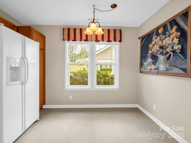 5802 Wood Duck Way, Hendersonville, NC 28792 - unfurnished dining area with baseboards