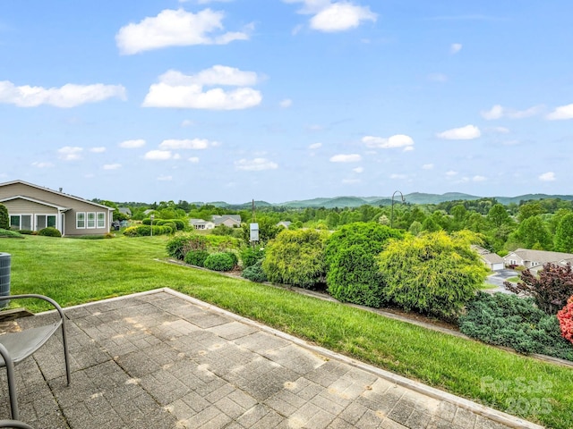 5802 Wood Duck Way, Hendersonville, NC 28792 - view of patio featuring a mountain view and central AC