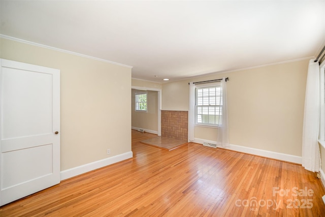 2125 Chatham Ave, Charlotte, NC 28205 - unfurnished room featuring visible vents, ornamental molding, baseboards, and wood finished floors