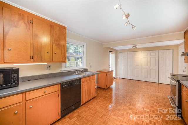 2125 Chatham Ave, Charlotte, NC 28205 - kitchen with brown cabinetry, crown molding, dark countertops, a sink, and black appliances