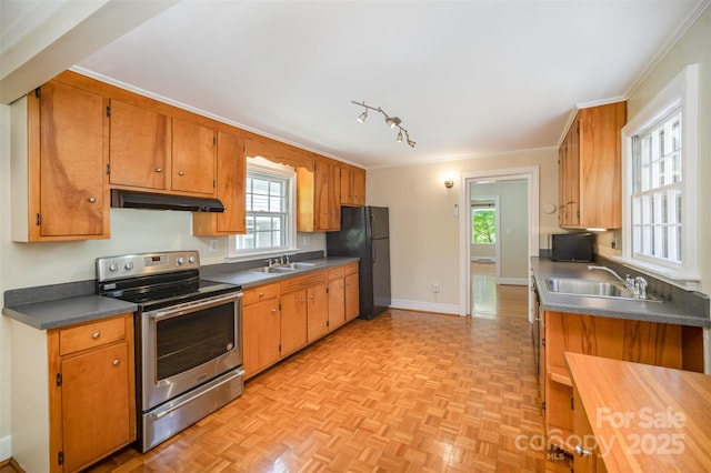 2125 Chatham Ave, Charlotte, NC 28205 - kitchen featuring a sink, crown molding, freestanding refrigerator, and stainless steel range with electric cooktop