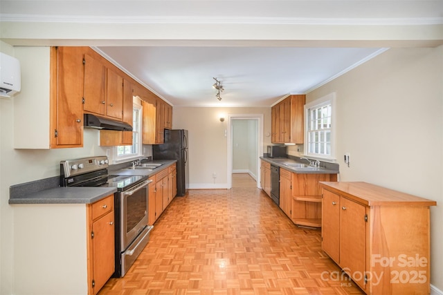 2125 Chatham Ave, Charlotte, NC 28205 - kitchen featuring plenty of natural light, under cabinet range hood, black appliances, and dark countertops