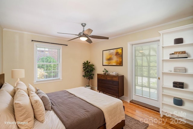 2125 Chatham Ave, Charlotte, NC 28205 - bedroom featuring access to outside, ornamental molding, and light wood finished floors