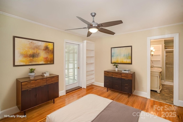 2125 Chatham Ave, Charlotte, NC 28205 - bedroom featuring crown molding, light wood-type flooring, baseboards, access to outside, and ensuite bath