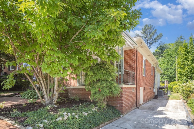 2125 Chatham Ave, Charlotte, NC 28205 - view of side of home featuring brick siding and central air condition unit