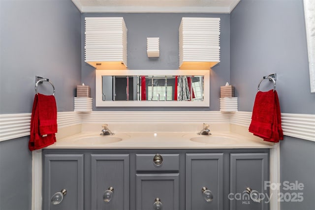 bathroom with double vanity and a sink