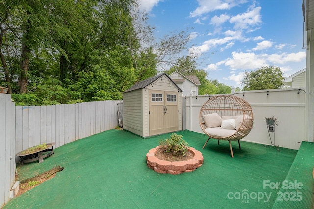 view of shed featuring a fenced backyard