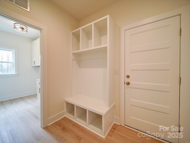 1706 Ruben Rd, Monroe, NC 28112 - mudroom with baseboards, visible vents, and light wood-style floors