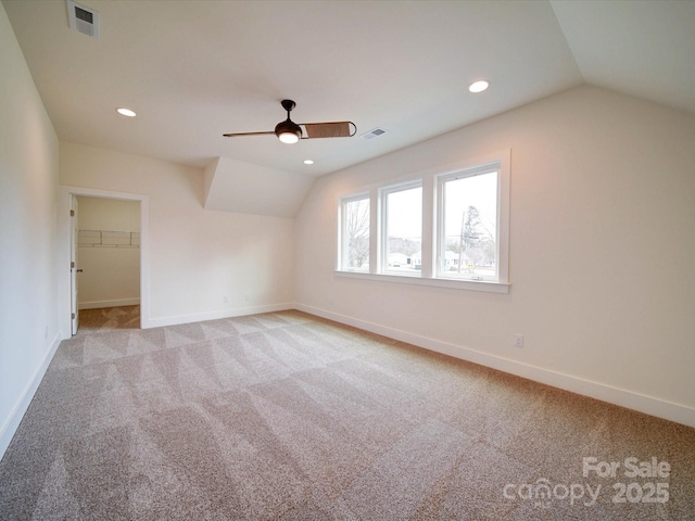 1706 Ruben Rd, Monroe, NC 28112 - additional living space featuring visible vents, ceiling fan, carpet, and vaulted ceiling