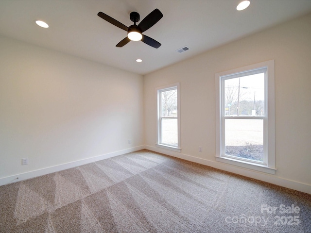 1706 Ruben Rd, Monroe, NC 28112 - spare room featuring recessed lighting, visible vents, light colored carpet, and plenty of natural light