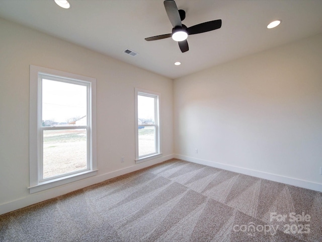 1706 Ruben Rd, Monroe, NC 28112 - empty room with baseboards, visible vents, light colored carpet, and recessed lighting
