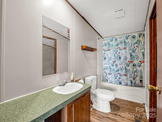 bathroom with vanity, visible vents, wood finished floors, toilet, and shower / bathtub combination with curtain