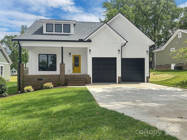 420 Fulton Dr, Kings Mountain, NC 28086 - modern farmhouse style home with board and batten siding, an attached garage, a shingled roof, and a front lawn