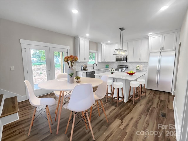 420 Fulton Dr, Kings Mountain, NC 28086 - dining room featuring wood finished floors, french doors, and recessed lighting