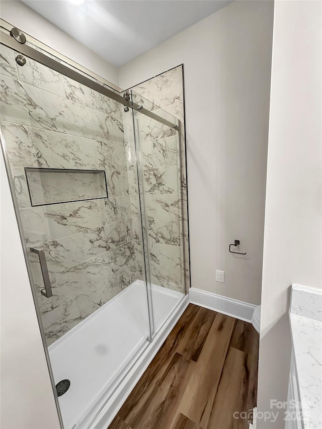 420 Fulton Dr, Kings Mountain, NC 28086 - full bath with a marble finish shower, wood finished floors, and baseboards