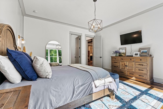 bedroom with wood finished floors