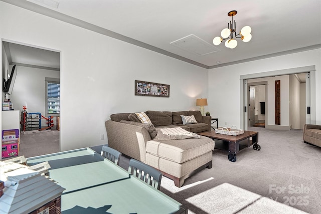 living room with carpet flooring and attic access