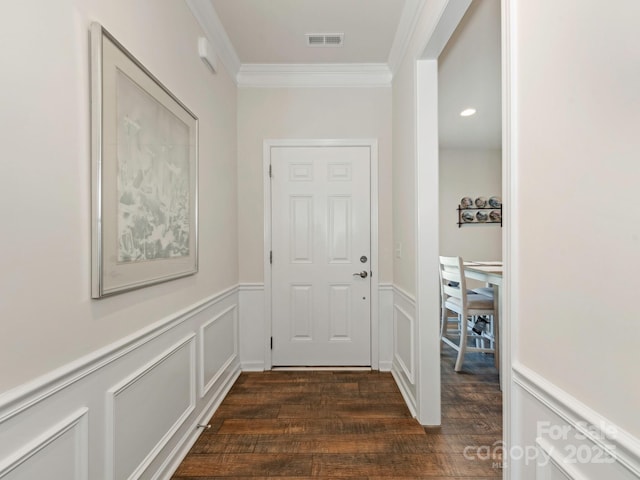 1026 Kirby Dr, Fort Mill, SC 29715 - doorway to outside with ornamental molding, dark wood finished floors, wainscoting, and a decorative wall