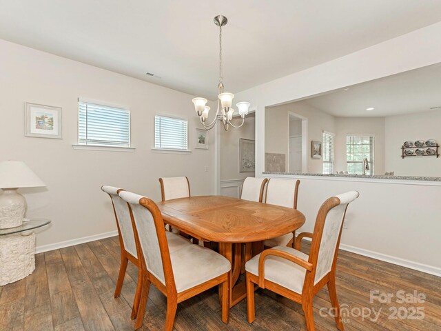 1026 Kirby Dr, Fort Mill, SC 29715 - dining room featuring hardwood / wood-style floors, a chandelier, and baseboards
