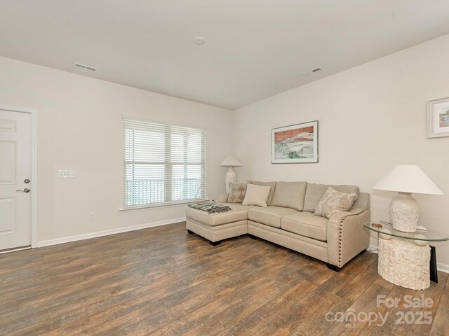1026 Kirby Dr, Fort Mill, SC 29715 - living room featuring dark wood-type flooring and baseboards