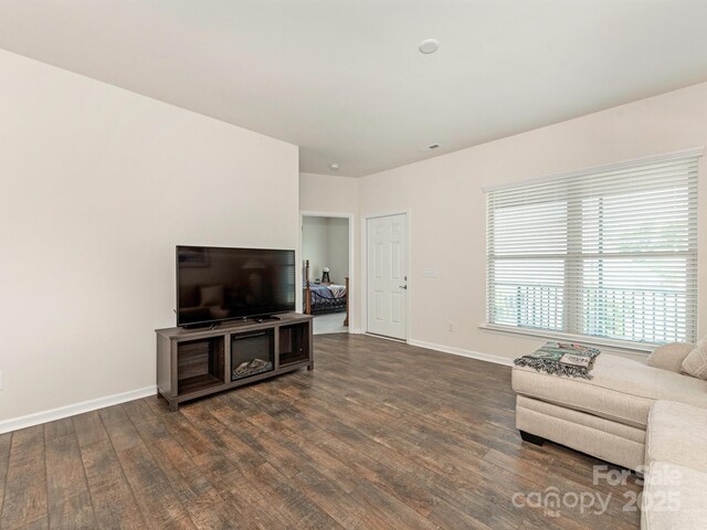 1026 Kirby Dr, Fort Mill, SC 29715 - living area with dark wood-type flooring and baseboards