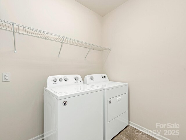 1026 Kirby Dr, Fort Mill, SC 29715 - laundry area featuring washing machine and dryer, baseboards, and light tile patterned floors