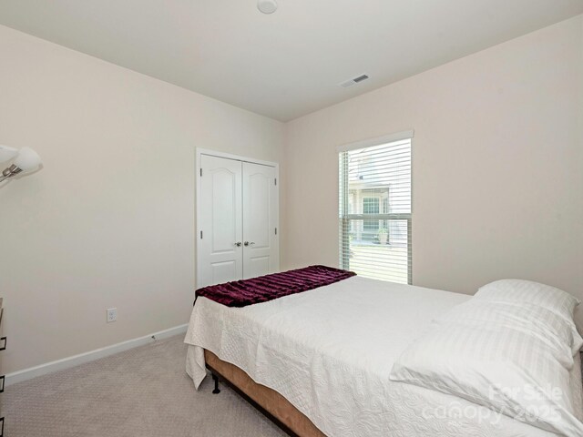 1026 Kirby Dr, Fort Mill, SC 29715 - carpeted bedroom with baseboards and a closet