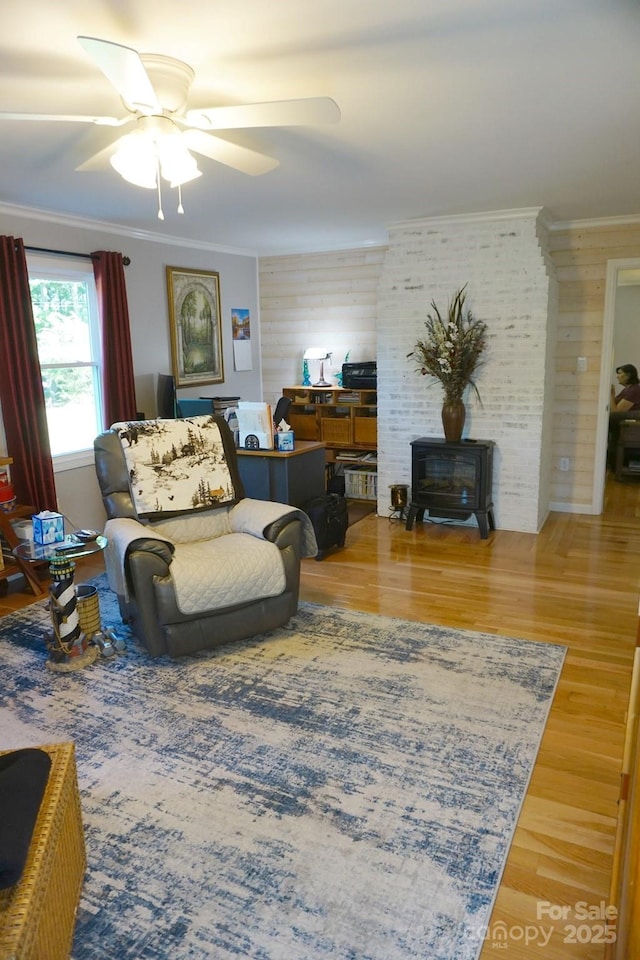 854 Silver Fox Dr, Concord, NC 28025 - living area with wood finished floors, a ceiling fan, ornamental molding, and wooden walls