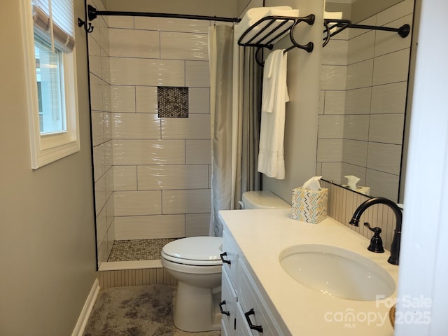 854 Silver Fox Dr, Concord, NC 28025 - bathroom with toilet, tiled shower, and vanity