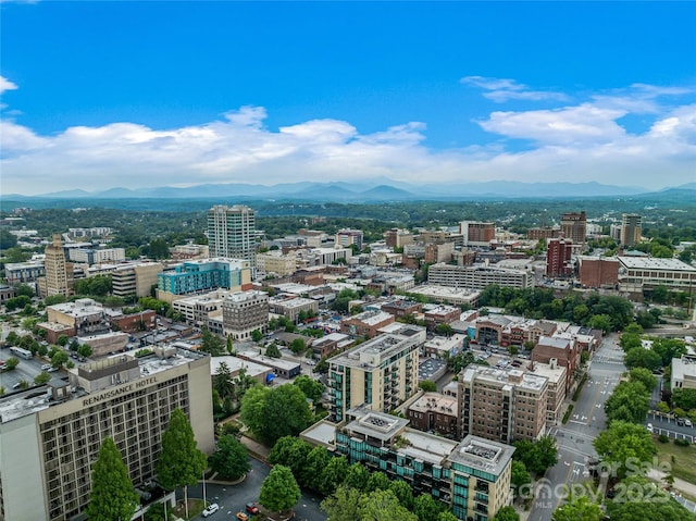 bird's eye view featuring a view of city and a mountain view