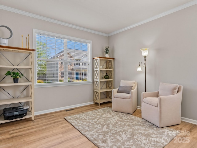 3 Holmes Ln, Arden, NC 28704 - living area featuring crown molding, visible vents, wood finished floors, and baseboards