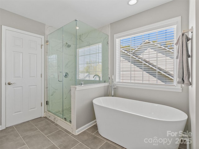 3 Holmes Ln, Arden, NC 28704 - full bath with baseboards, a marble finish shower, recessed lighting, a freestanding tub, and tile patterned flooring