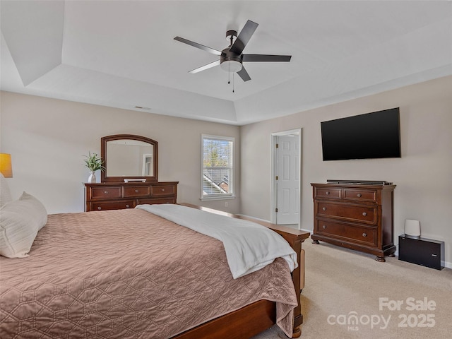 3 Holmes Ln, Arden, NC 28704 - bedroom with a raised ceiling, ceiling fan, baseboards, and light carpet