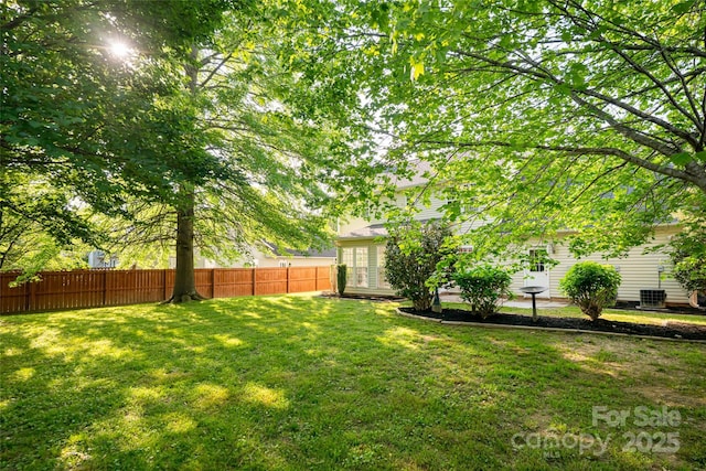 view of yard featuring fence
