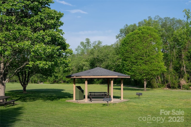 surrounding community featuring a lawn and a gazebo