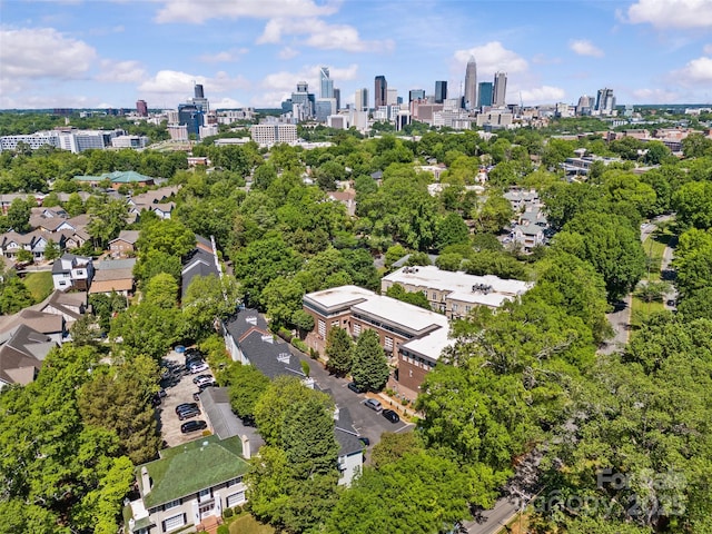 birds eye view of property featuring a city view