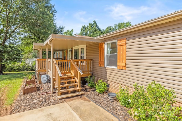 1005 Caldon Dr, Stanley, NC 28164 - view of exterior entry with a deck