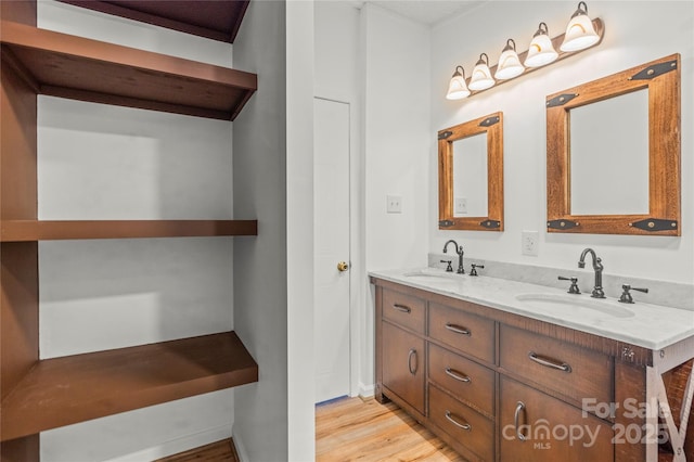 1005 Caldon Dr, Stanley, NC 28164 - full bath featuring double vanity and wood finished floors