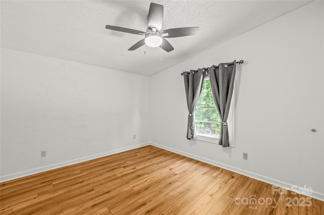 1005 Caldon Dr, Stanley, NC 28164 - empty room featuring light wood-style flooring, a textured ceiling, and ceiling fan