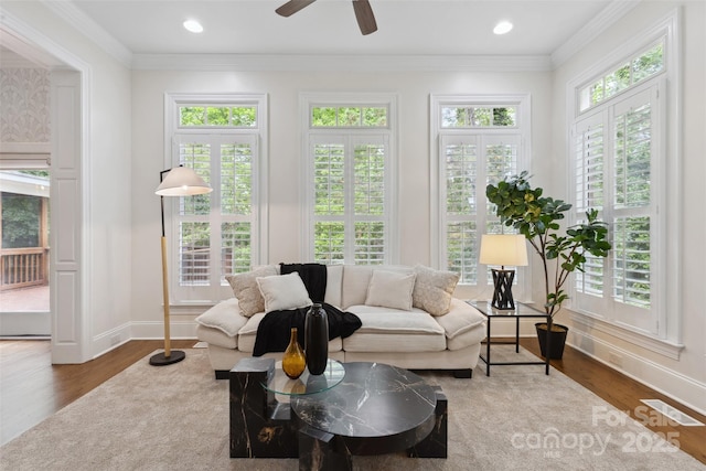 sunroom featuring visible vents and french doors