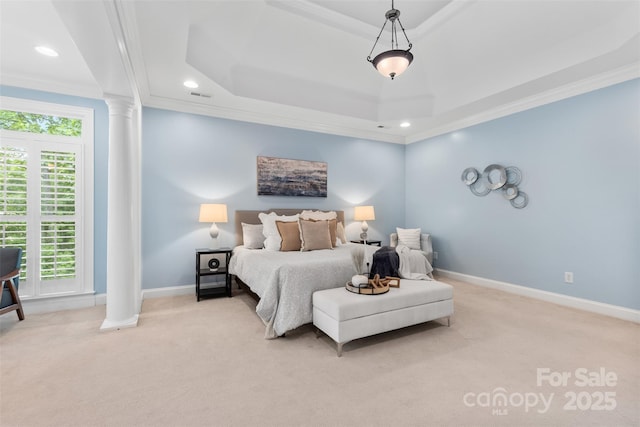 bedroom with ornamental molding, decorative columns, light carpet, baseboards, and a raised ceiling