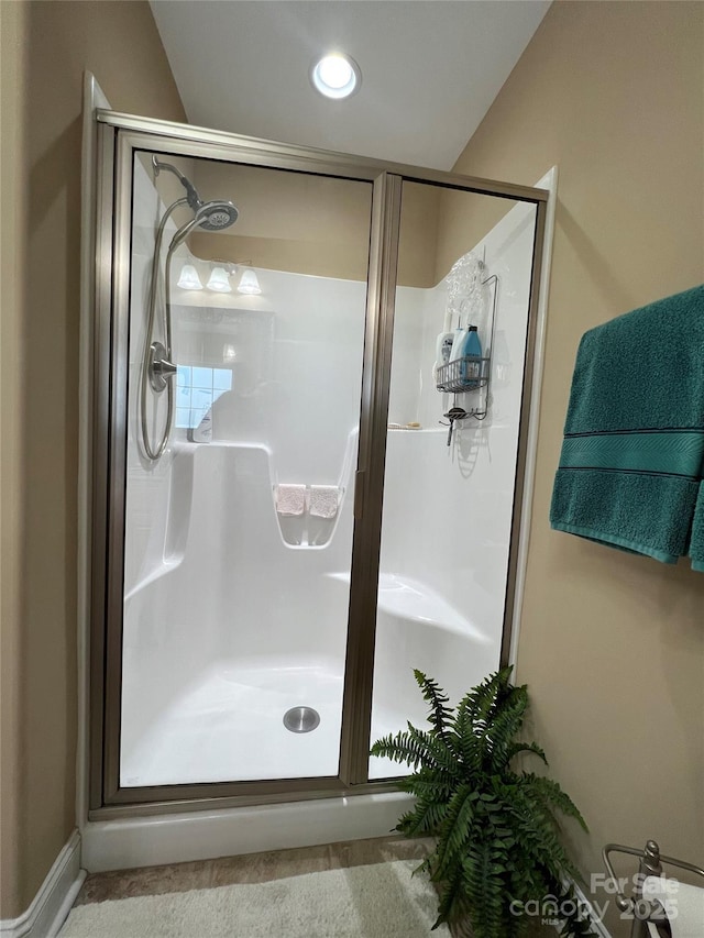bathroom with a stall shower