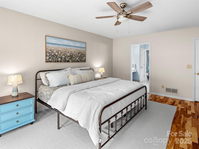 103 Higgins Rd, Fletcher, NC 28732 - bedroom featuring baseboards, visible vents, a ceiling fan, and wood finished floors