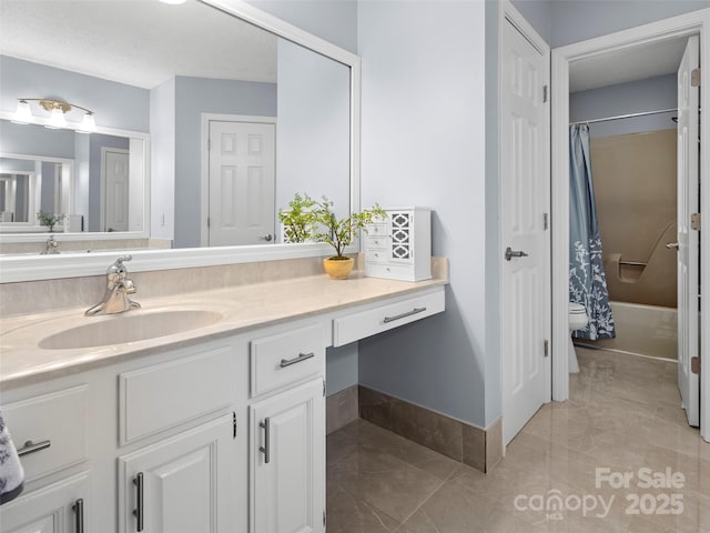 103 Higgins Rd, Fletcher, NC 28732 - full bathroom featuring vanity, toilet, baseboards, and shower / bath combo with shower curtain