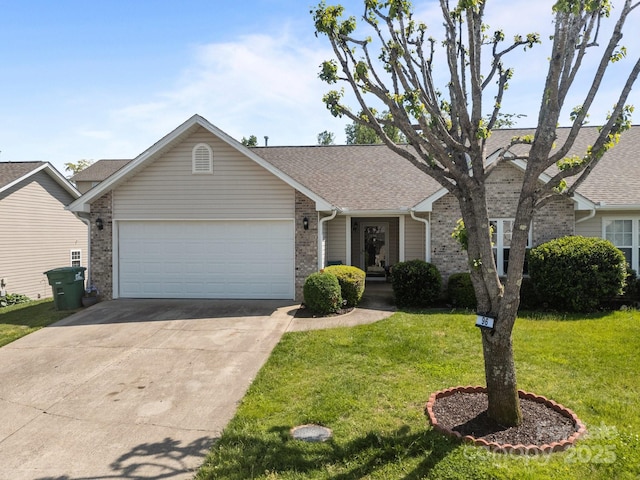 single story home featuring an attached garage, brick siding, driveway, and a front yard