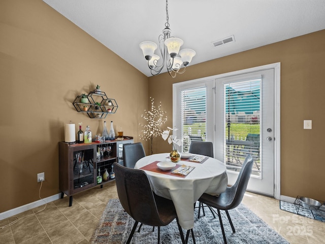 dining room with light tile patterned floors, baseboards, a chandelier, and visible vents